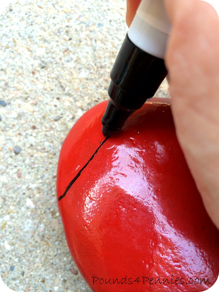 Black Sharpie Marker on Red Rock